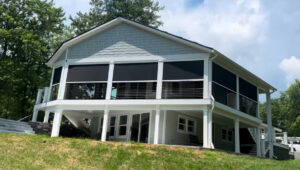 Motorized retractable screens for patios, porches, and large openings.